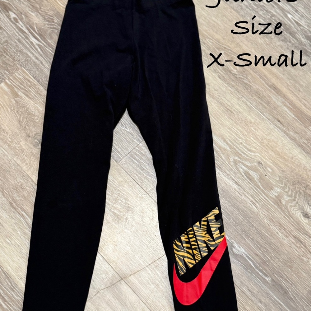 Nike  Women Junior Black Leggings with Red and Gold Logo. Size XS